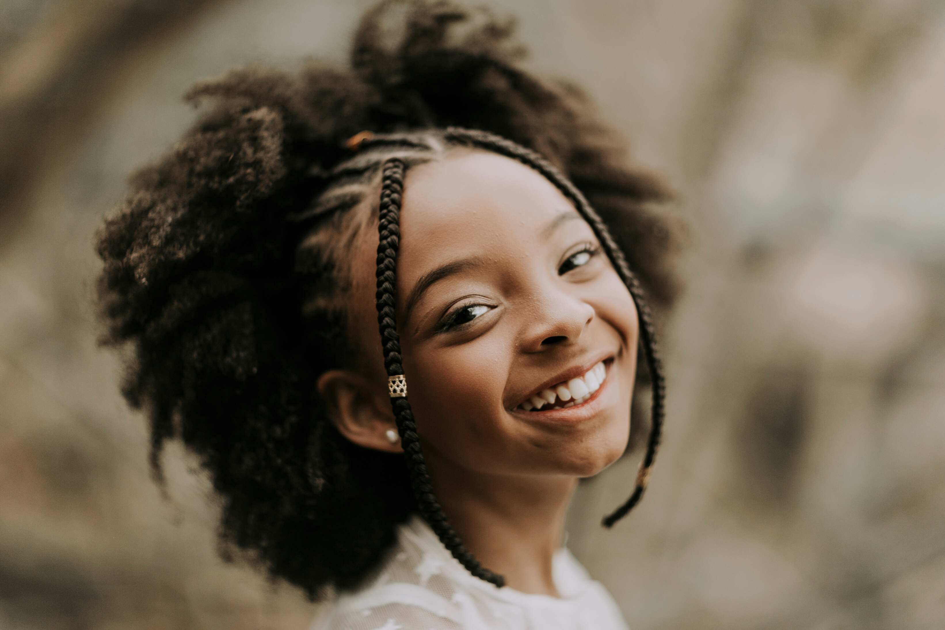 Cheerful black girl with Afro hairstyle